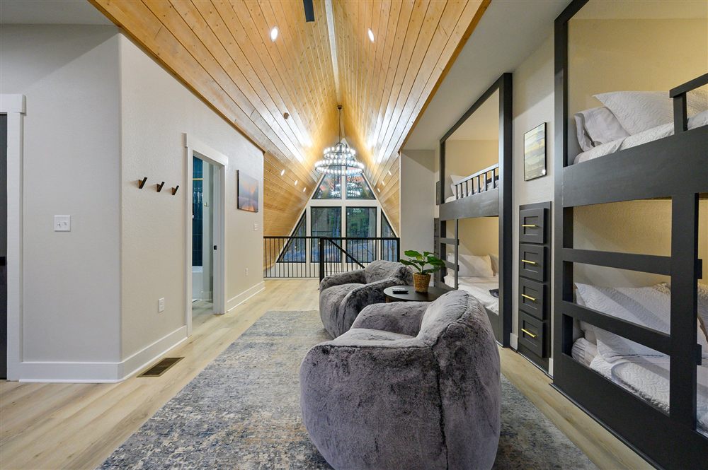 Adventus playroom with bunk beds and lounge seating